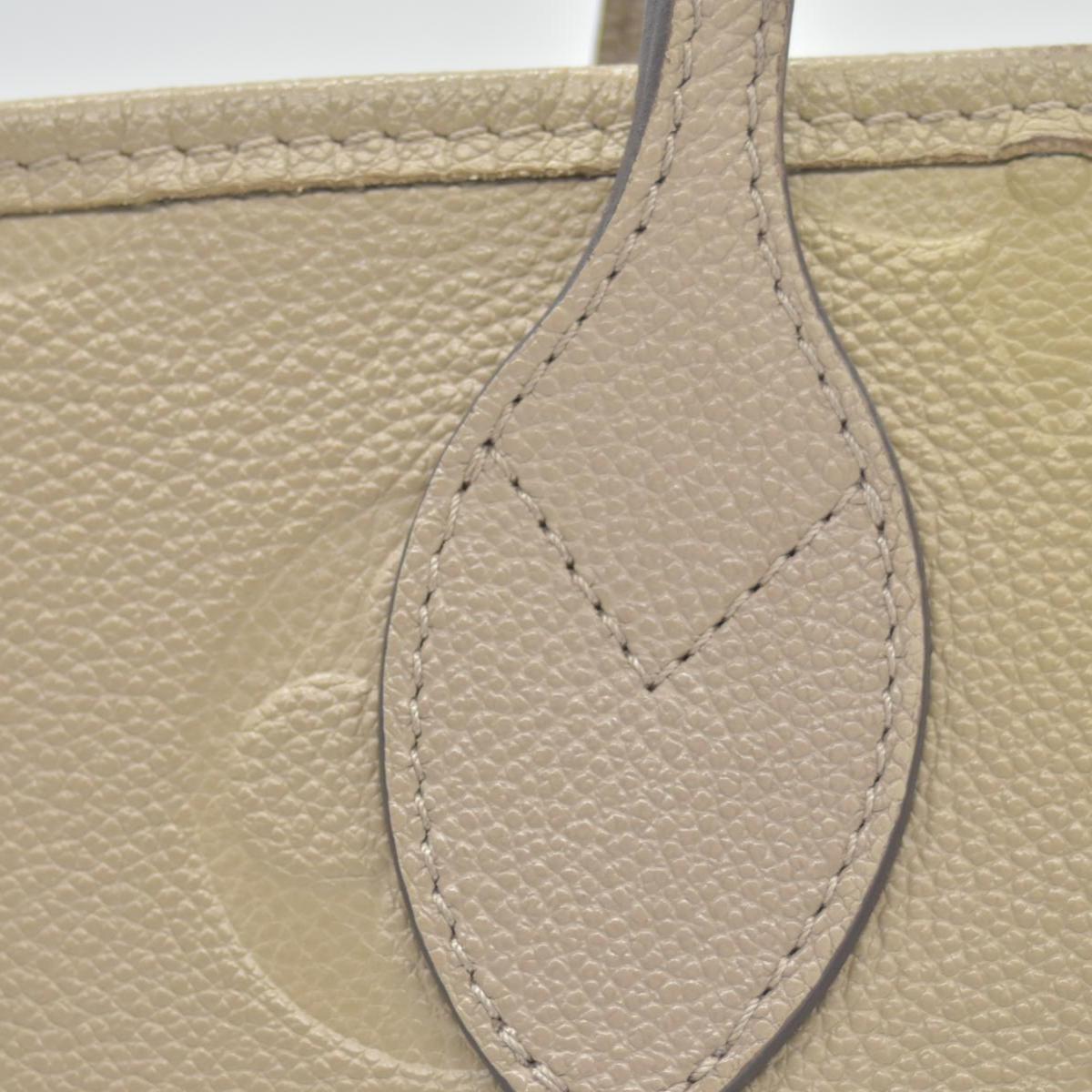 $2710 Louis Vuitton  Empreinte Monogram Giant Neverfull MM Tourterelle Tote