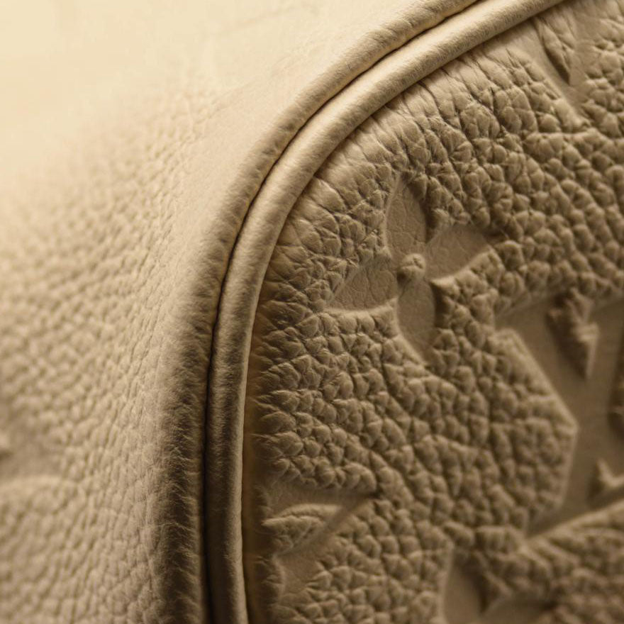 LOUIS VUITTON Empreinte Monogram Giant Neverfull MM Cream