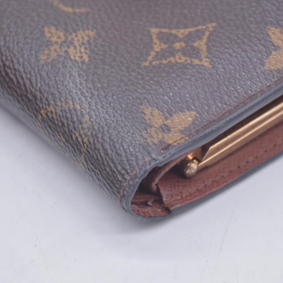 $735 2000 Louis Vuitton French Kiss Lock Monogram Wallet MI0080 CONSIGNMENT 10020917