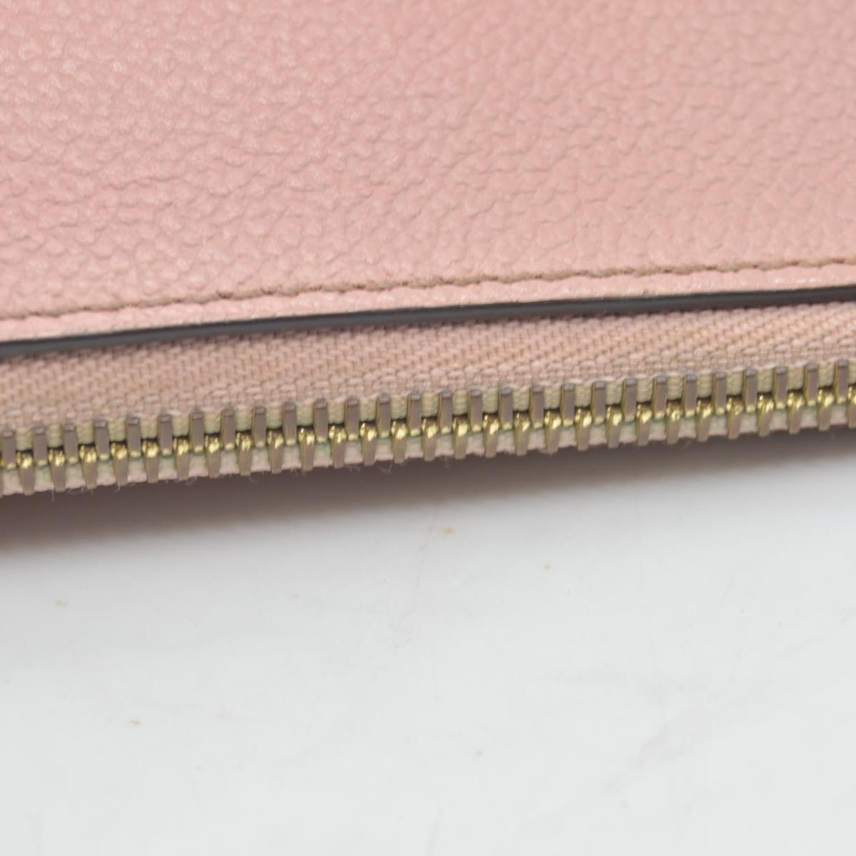 $970 Louis Vuitton Empreinte Daily Pouch Rose Poudre