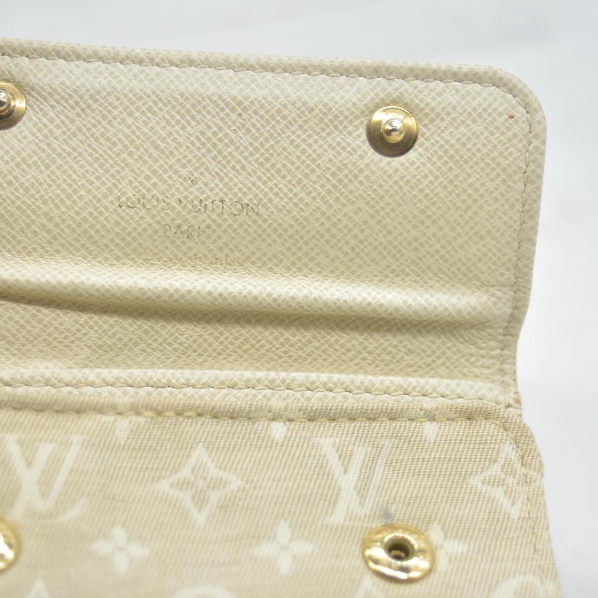 $250 LOUIS VUITTON Monogram Mini Lin 4 Key Holder CONSIGNMENT