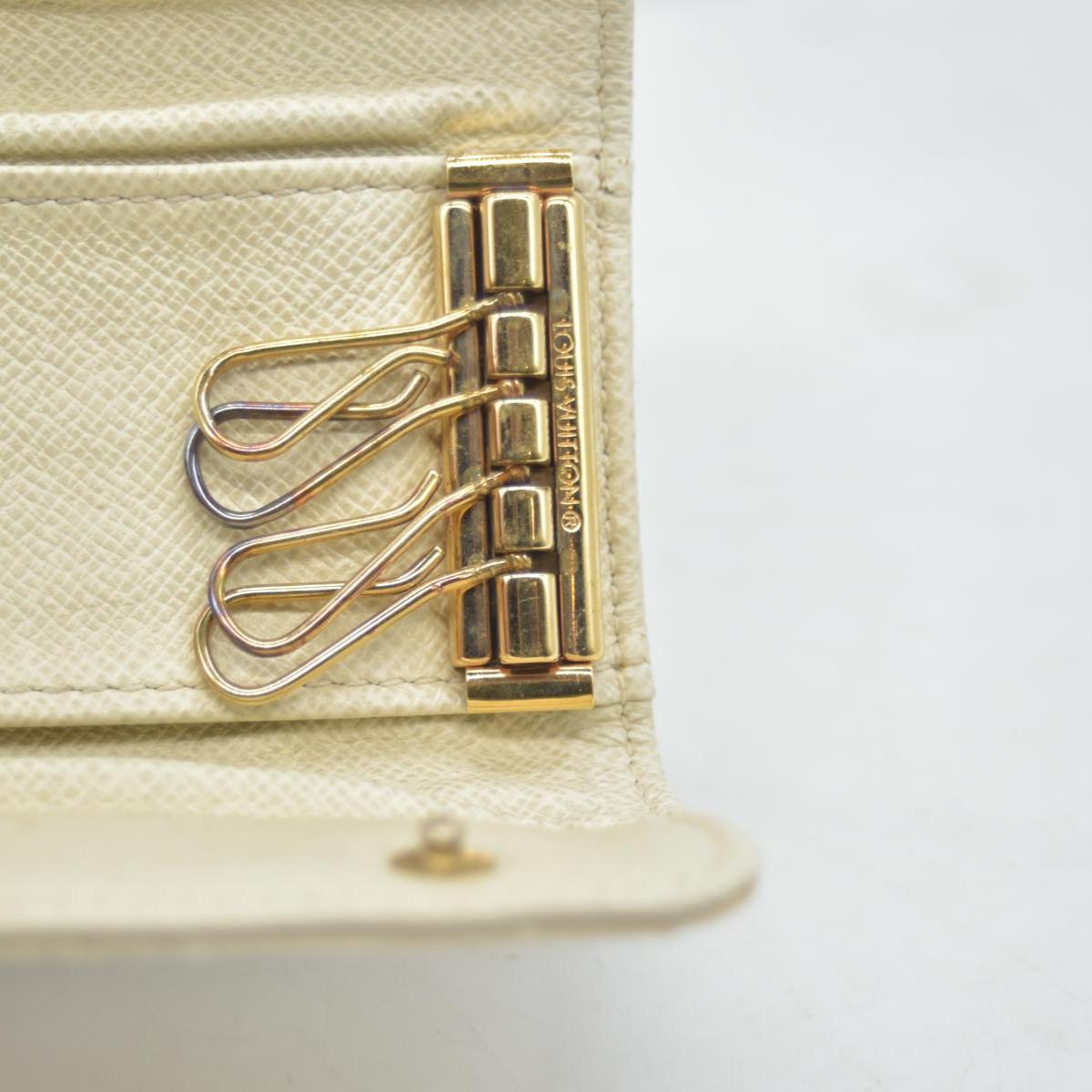 $250 LOUIS VUITTON Monogram Mini Lin 4 Key Holder CONSIGNMENT