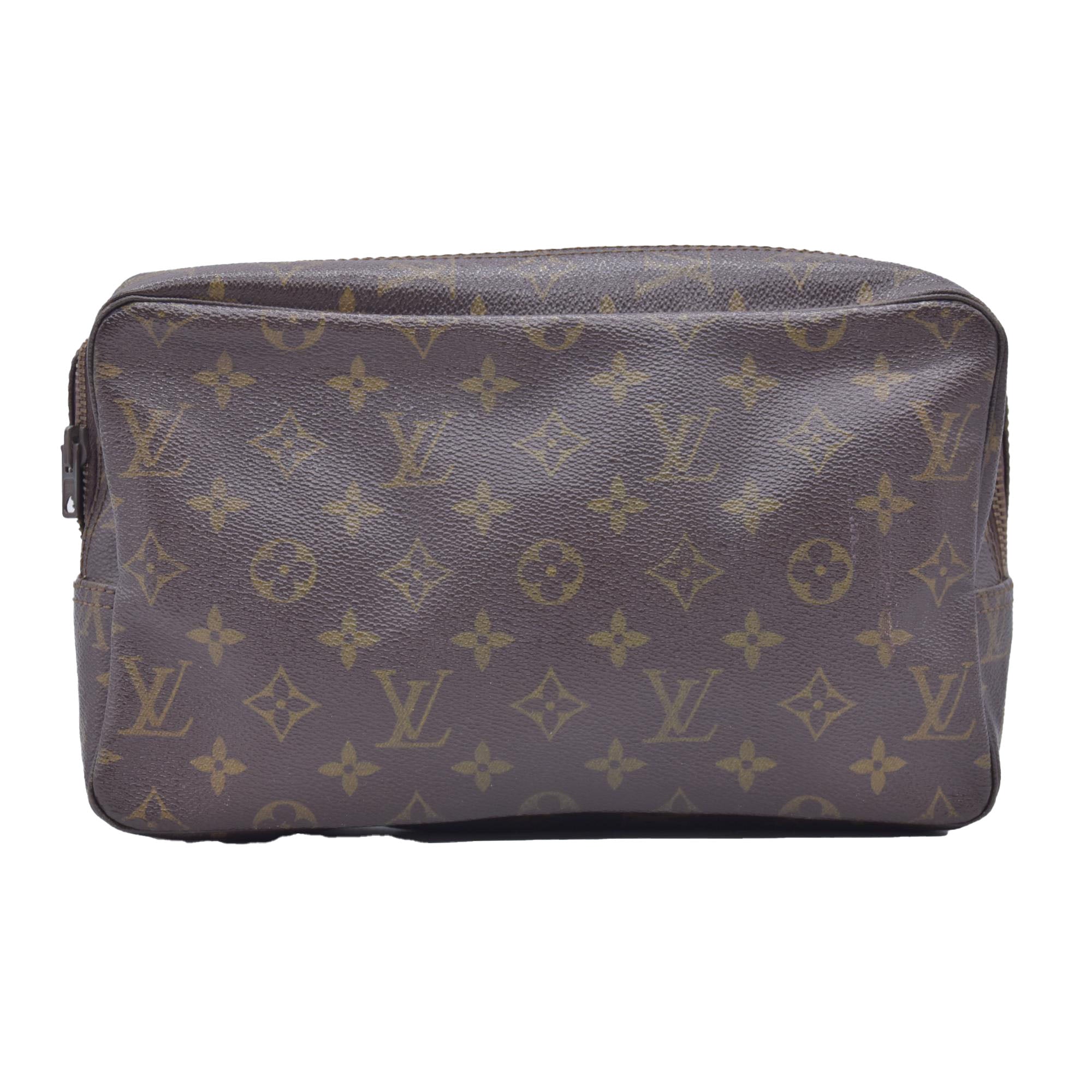 $600 Louis Vuitton Monogram Trousse Toilette 23 821