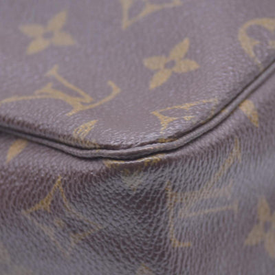 $600 Louis Vuitton Monogram Trousse Toilette 23 821