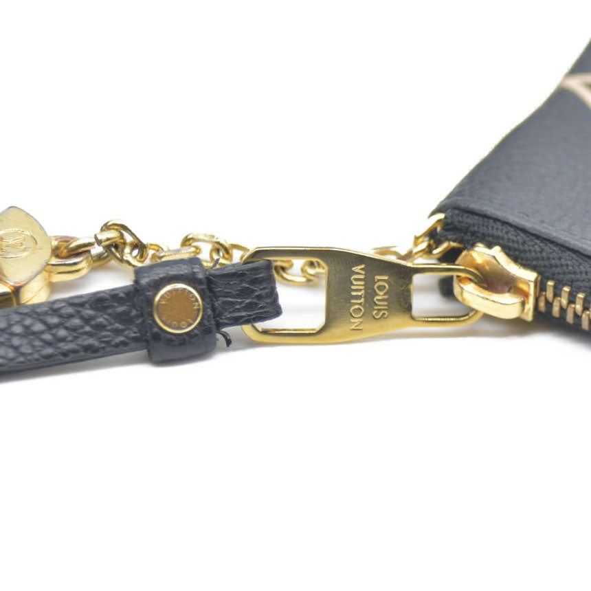 $530 Louis Vuitton Bicolor Monogram Empreinte Leather