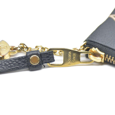 $530 Louis Vuitton Bicolor Monogram Empreinte Leather