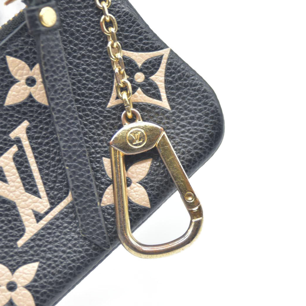$530 Louis Vuitton Bicolor Monogram Empreinte Leather