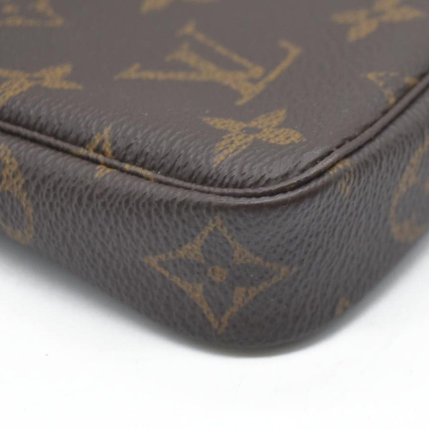 AUCTION  $1050 Louis Vuitton Monogram Mini Pochette Accessories SP2158