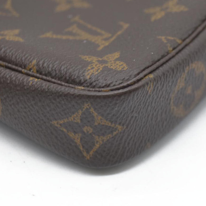 AUCTION  $1050 Louis Vuitton Monogram Mini Pochette Accessories SP2158