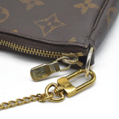 AUCTION  $1050 Louis Vuitton Monogram Mini Pochette Accessories SP2158
