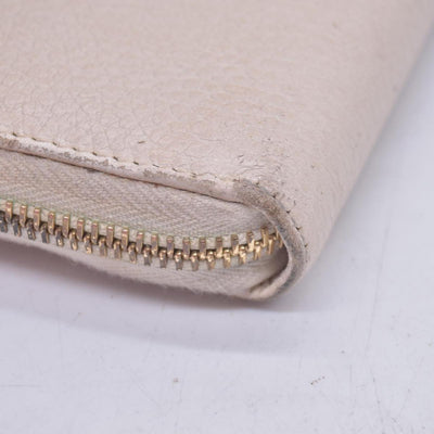 $660 2005 Gucci Cream GG Marmont zip around wallet 10021060