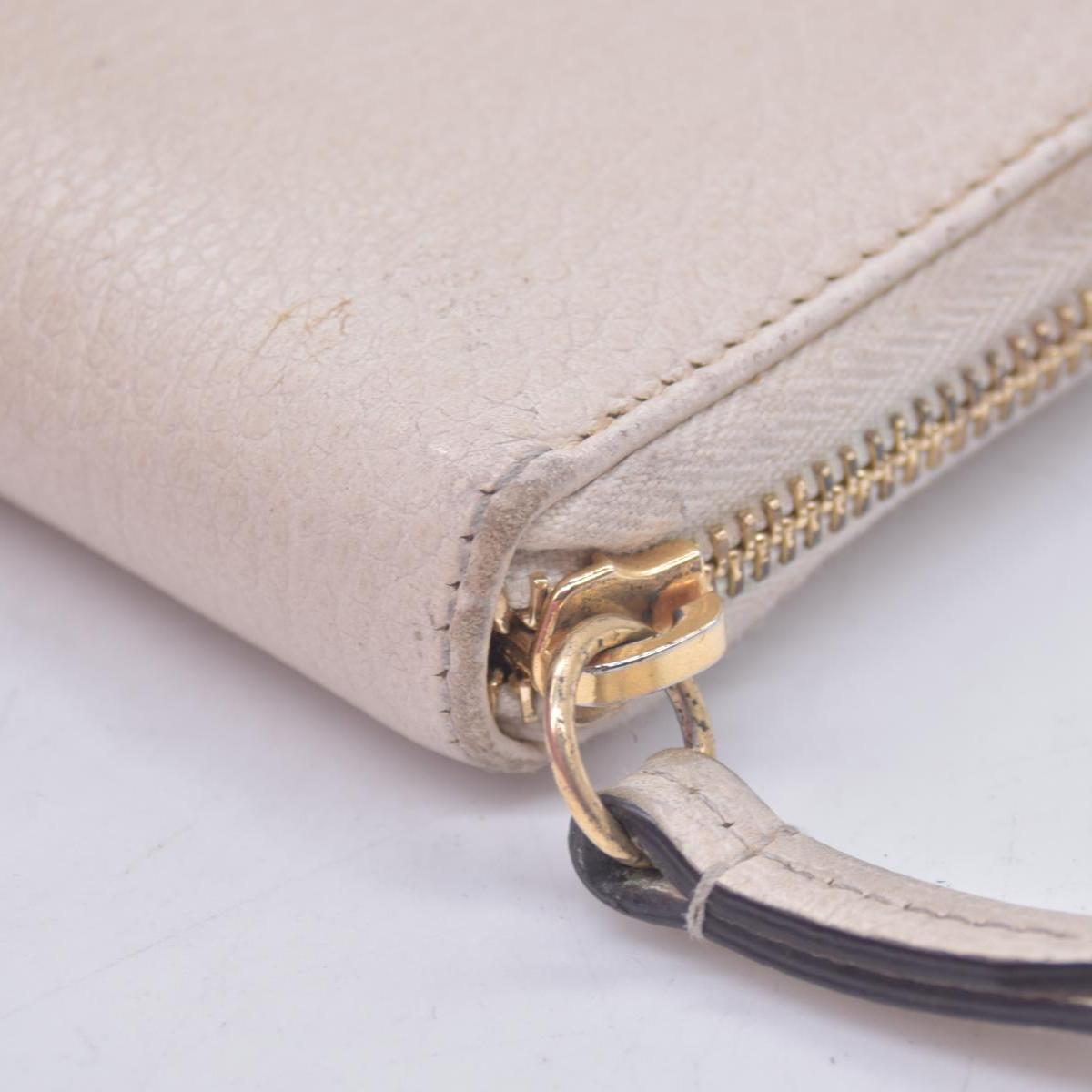 $660 2005 Gucci Cream GG Marmont zip around wallet 10021060