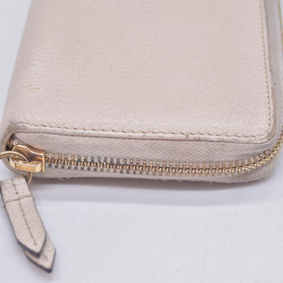 $660 2005 Gucci Cream GG Marmont zip around wallet 10021060