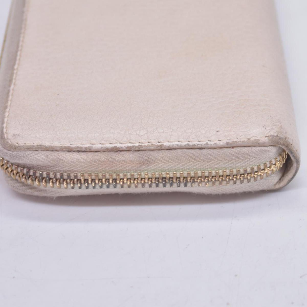 $660 2005 Gucci Cream GG Marmont zip around wallet 10021060