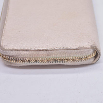 $660 2005 Gucci Cream GG Marmont zip around wallet 10021060