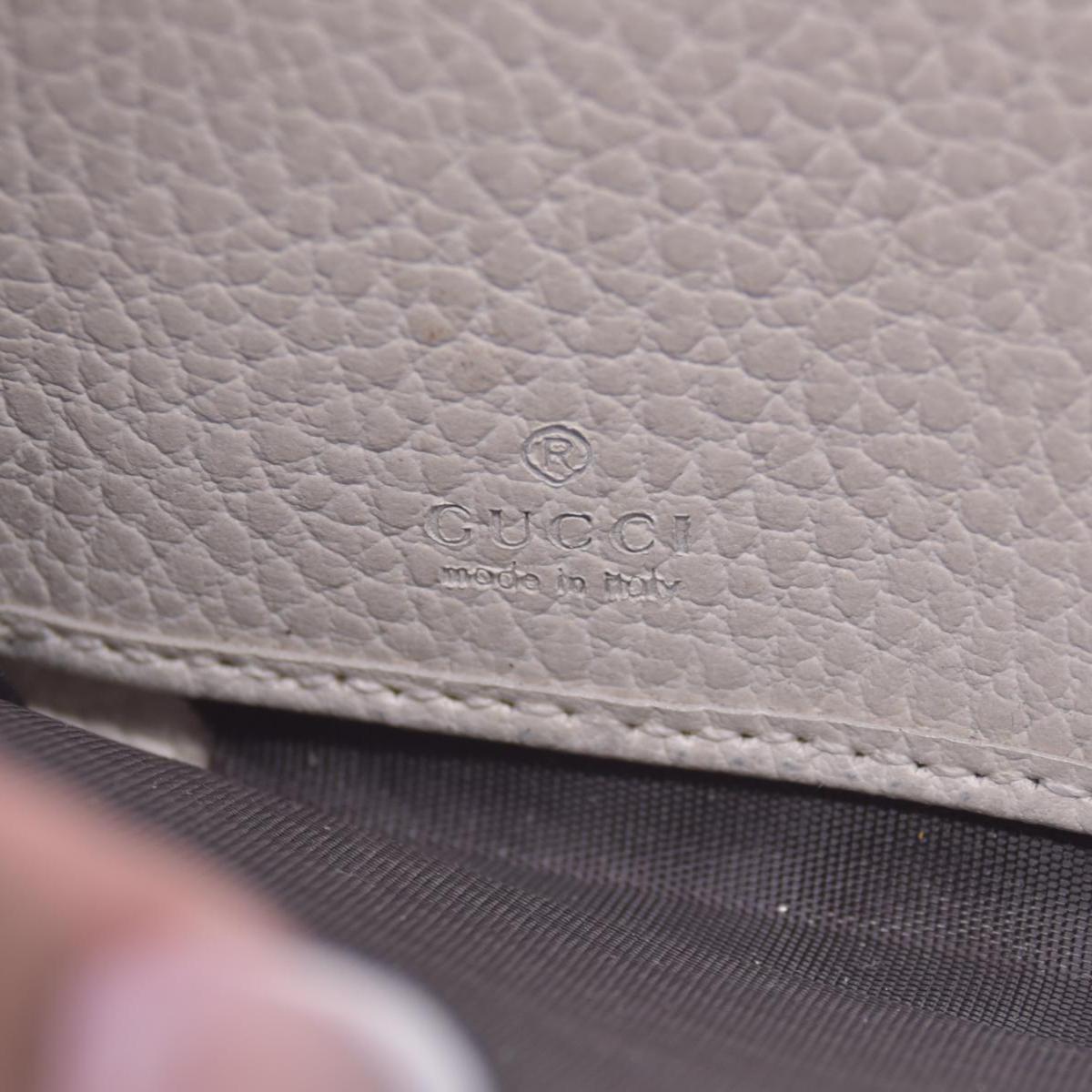 $660 2005 Gucci Cream GG Marmont zip around wallet 10021060