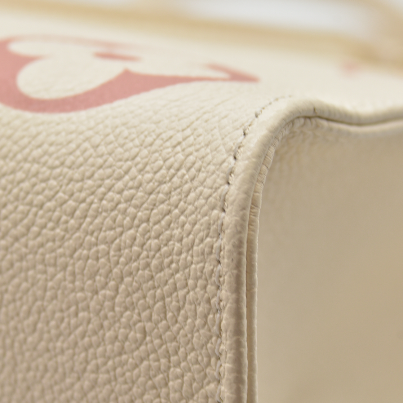 $3500 Louis Vuitton Rose Trianon/Creme Monogram Giant Empreinte Leather Onthego MM Bag