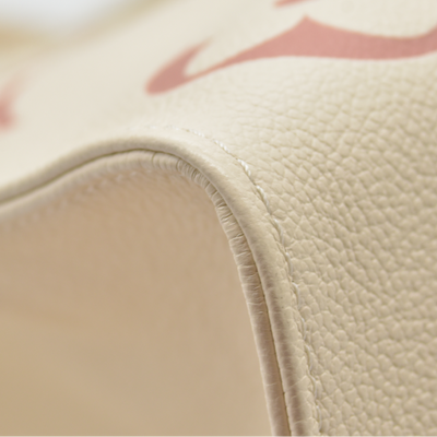 $3500 Louis Vuitton Rose Trianon/Creme Monogram Giant Empreinte Leather Onthego MM Bag