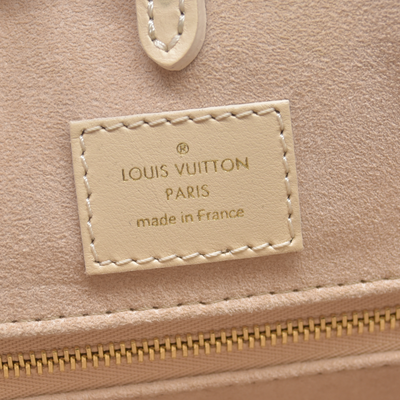 $3500 Louis Vuitton Rose Trianon/Creme Monogram Giant Empreinte Leather Onthego MM Bag