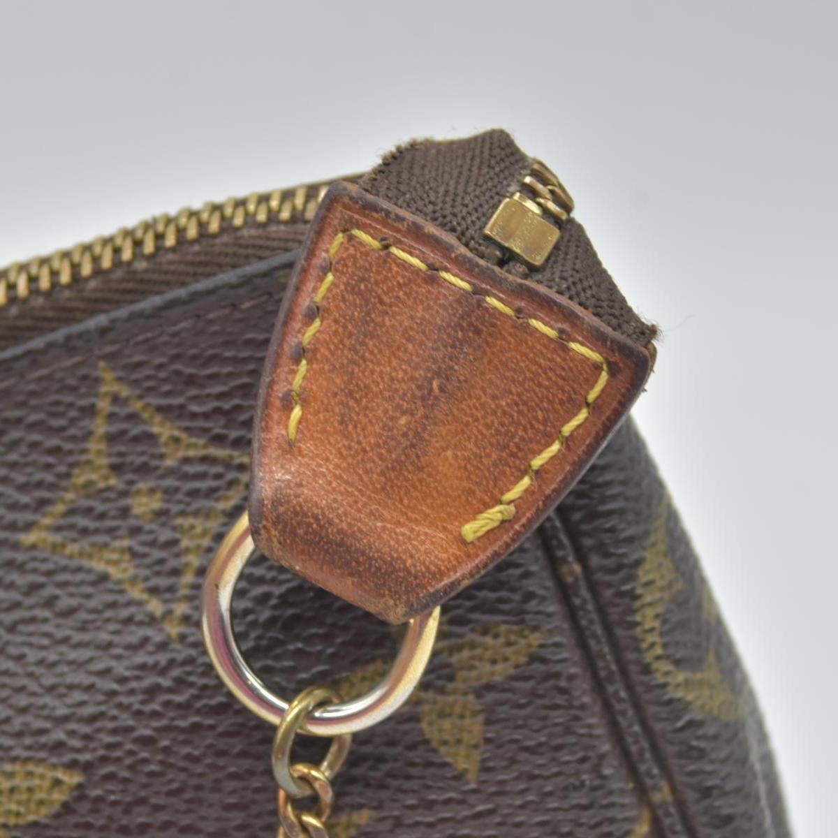 $890 2007 Louis Vuitton Monogram Mini Pochette Accessories Pouch DU4027