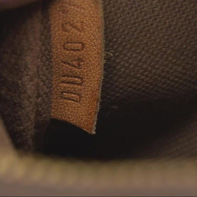 $890 2007 Louis Vuitton Monogram Mini Pochette Accessories Pouch DU4027