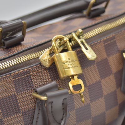 $1980 LOUIS VUITTON Damier Ebene Speedy Bandouliere 25 AA0221