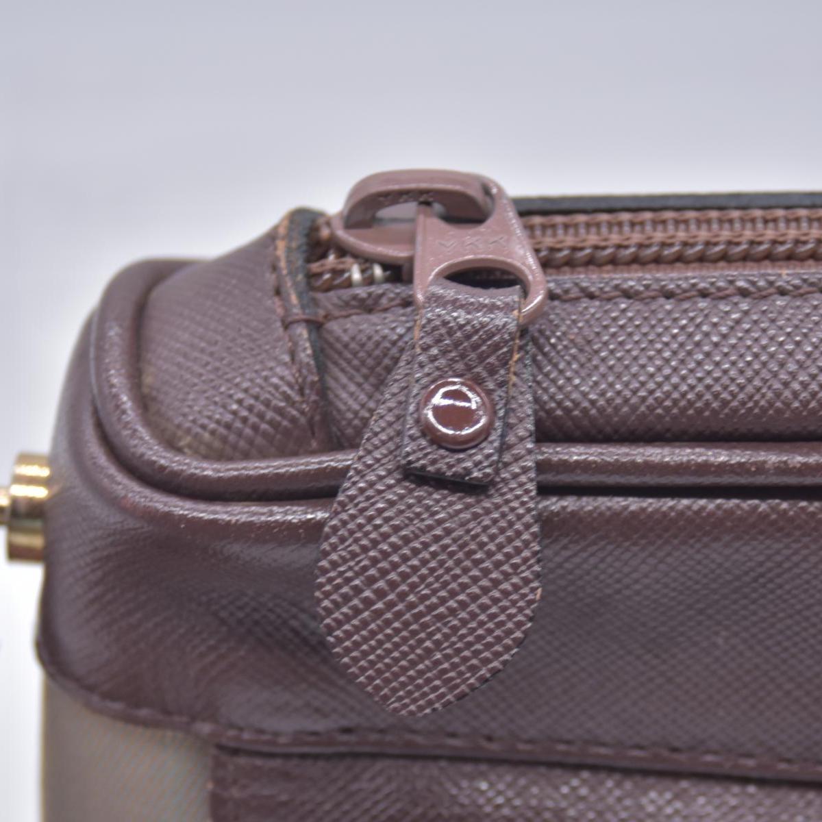 Burberry Canvas Clutch CONSIGNMENT 10021044