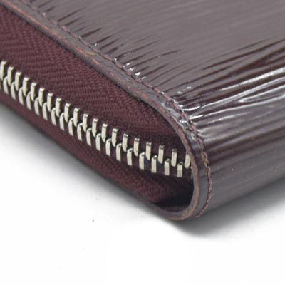 AUCTION $970 Louis Vuitton  Epi Electric Zippy Wallet Prune