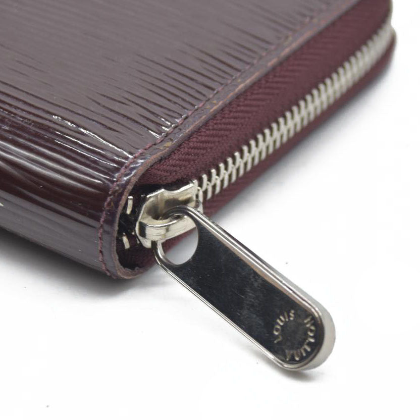 AUCTION $970 Louis Vuitton  Epi Electric Zippy Wallet Prune