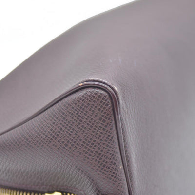 Louis Vuitton  Taiga Trousse Toilette PM Acajou