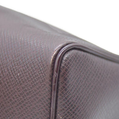 Louis Vuitton  Taiga Trousse Toilette PM Acajou