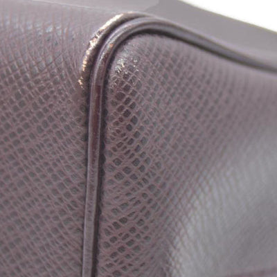 Louis Vuitton  Taiga Trousse Toilette PM Acajou