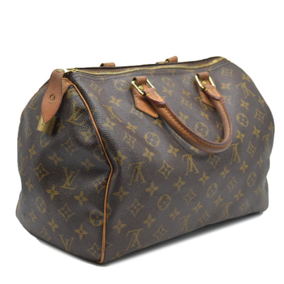 $1550 Louis Vuiton Monogram Speedy 30 SD1193