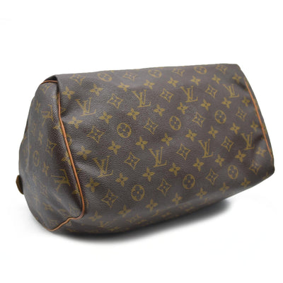 $1550 Louis Vuiton Monogram Speedy 30 SD1193