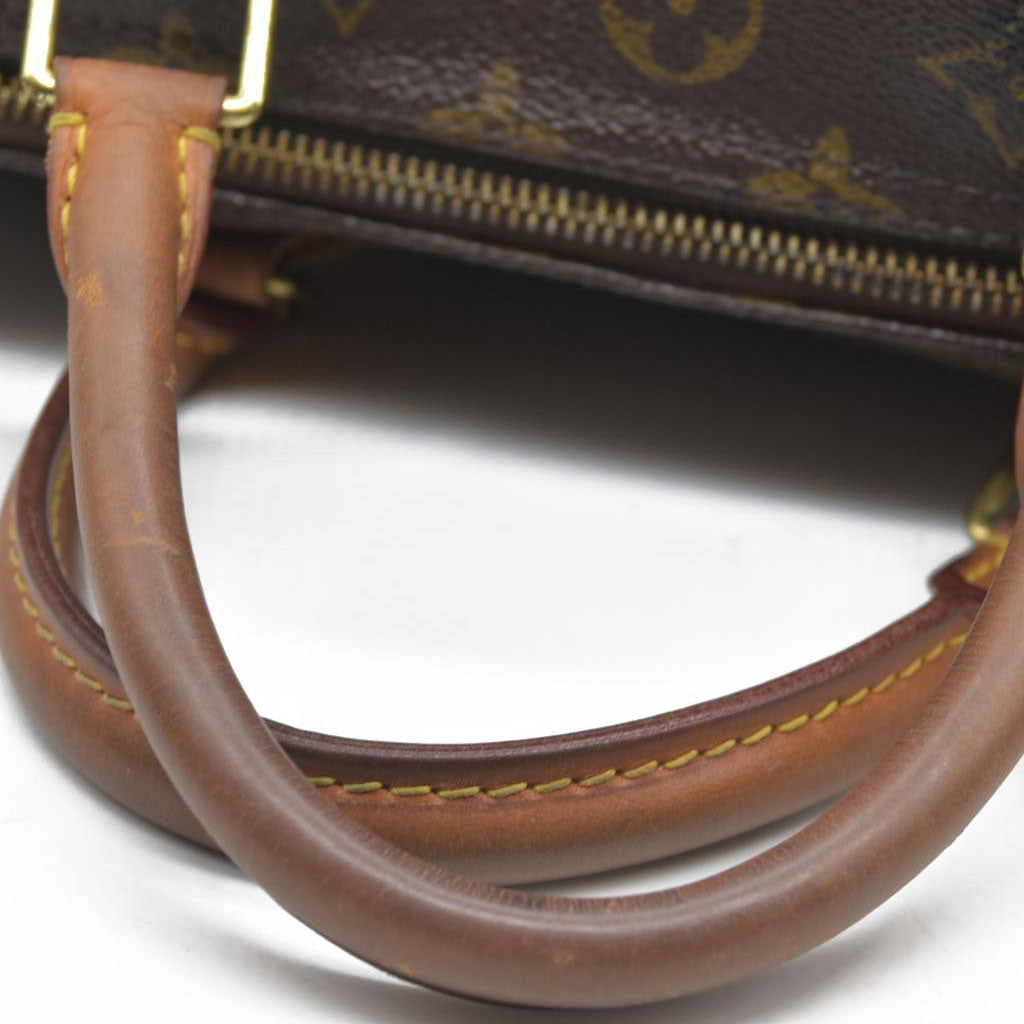 $1550 Louis Vuiton Monogram Speedy 30 SD1193