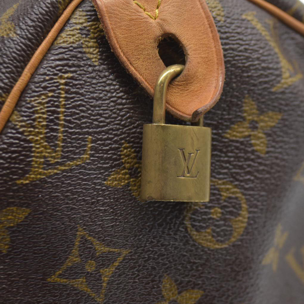 $1550 Louis Vuiton Monogram Speedy 30 SD1193