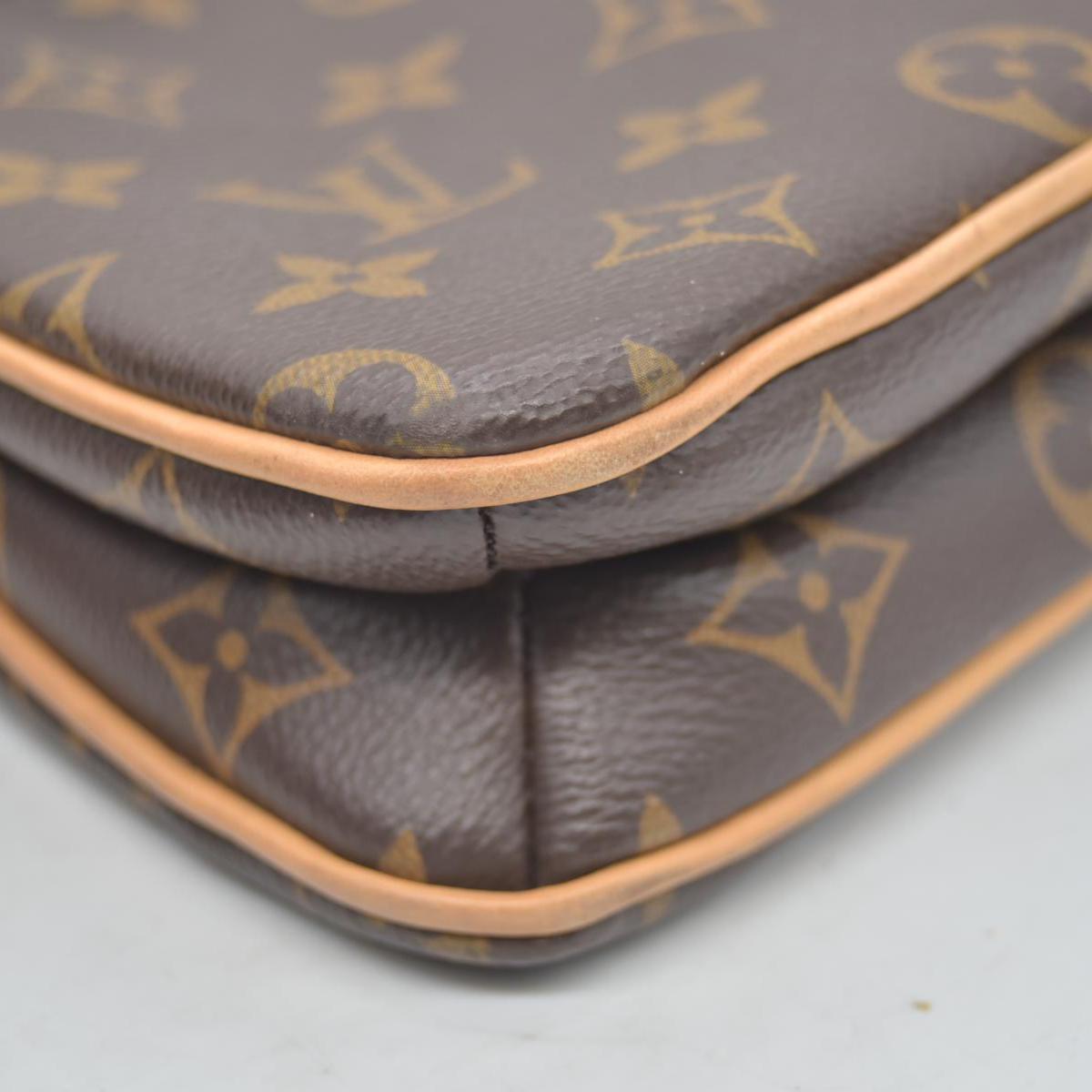 $1,950 LOUIS VUITTON Monogram Liv Pochette