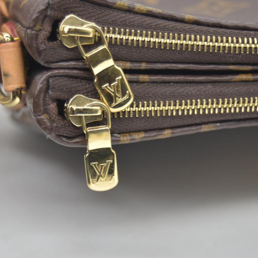 $1,950 LOUIS VUITTON Monogram Liv Pochette