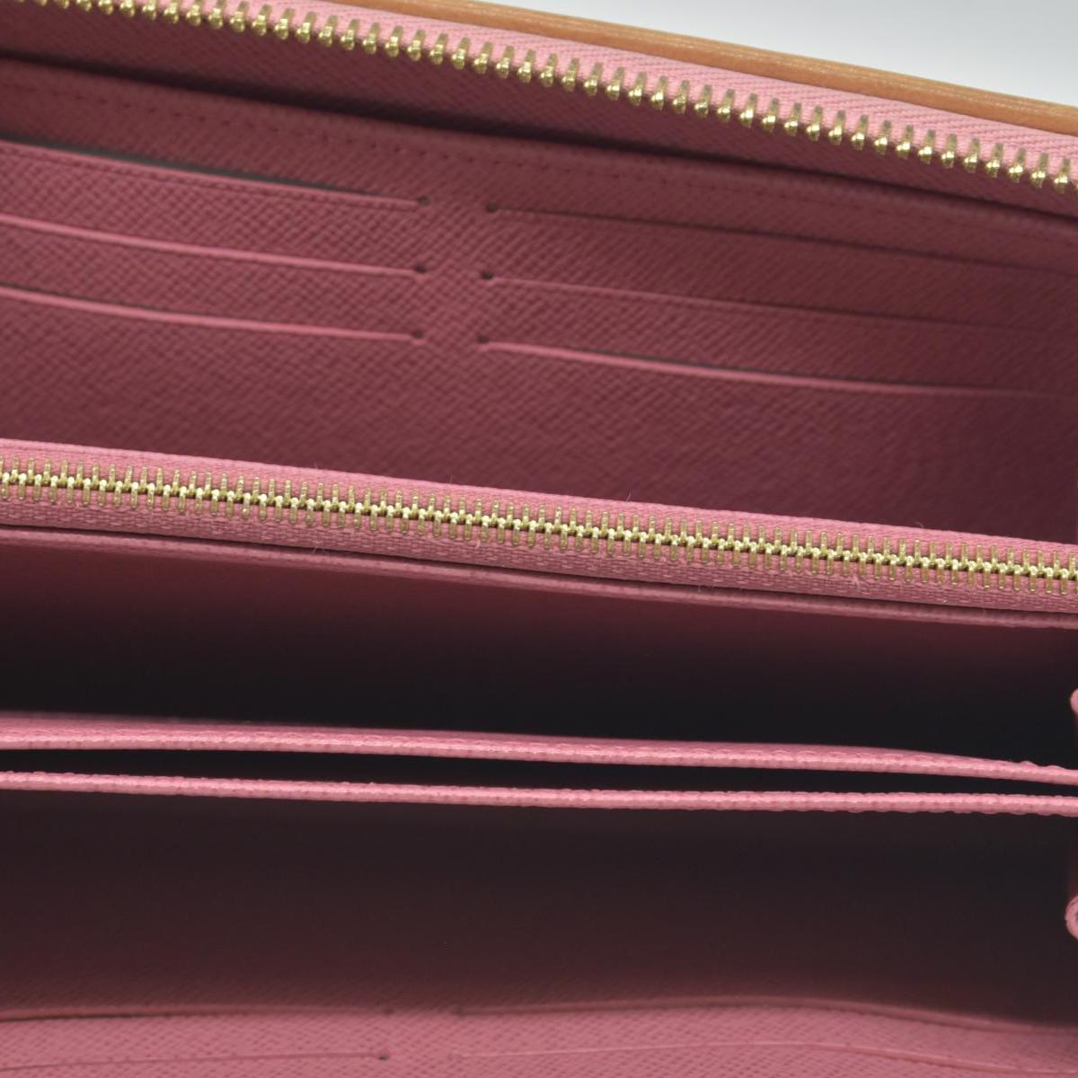 $1060 Louis Vuitton Denim Monogram Jacquard Zippy Wallet Pink