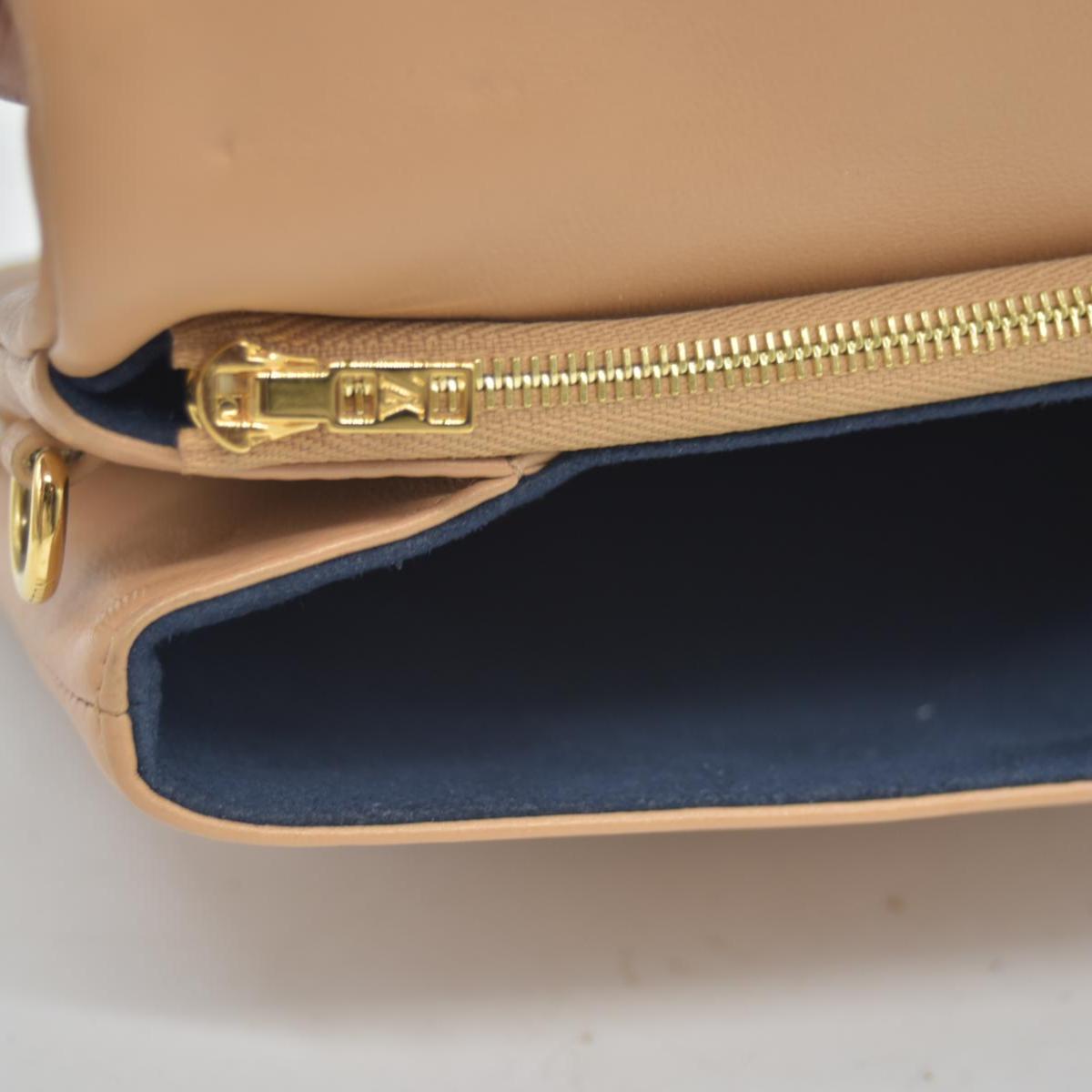 $3150 Louis Vuitton Lambskin Embossed Monogram Pochette Coussin Camel Color Transfer