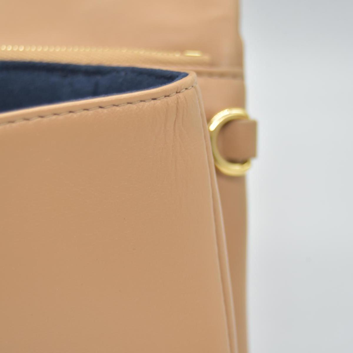 $3150 Louis Vuitton Lambskin Embossed Monogram Pochette Coussin Camel Color Transfer 10020331