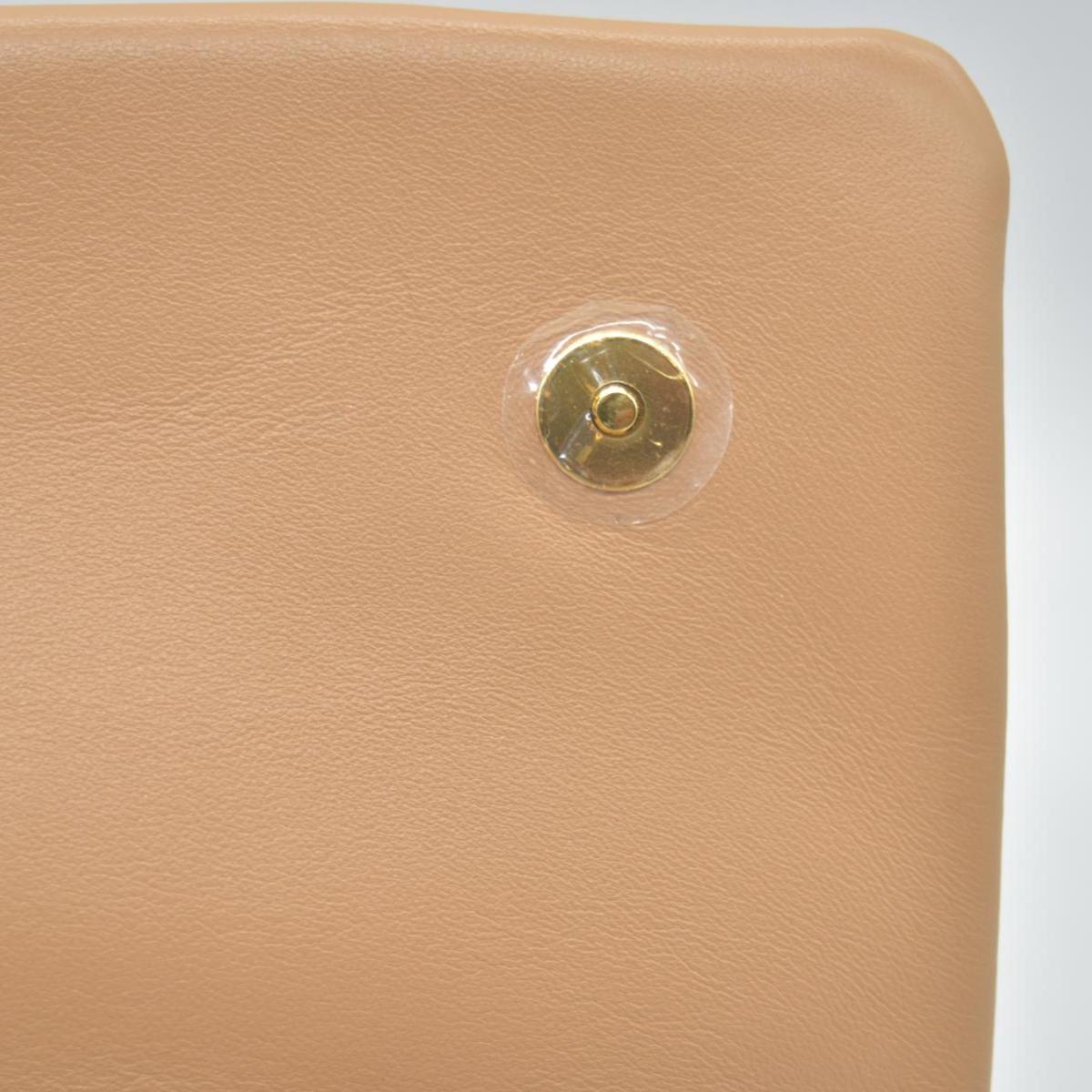 $3150 Louis Vuitton Lambskin Embossed Monogram Pochette Coussin Camel
