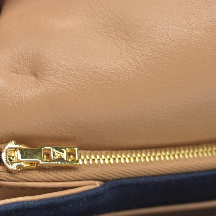 $3150 Louis Vuitton Lambskin Embossed Monogram Pochette Coussin Camel