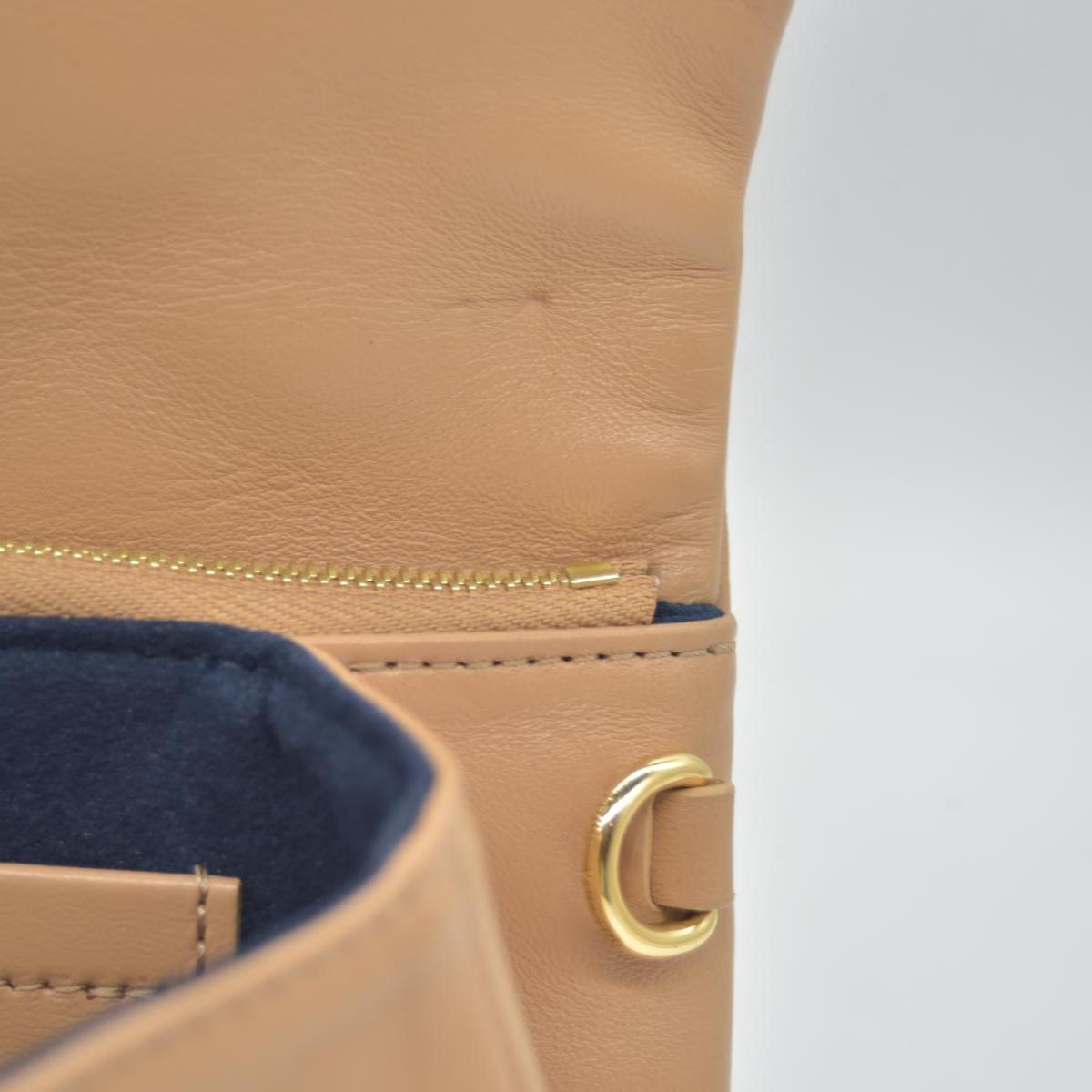 $3150 Louis Vuitton Lambskin Embossed Monogram Pochette Coussin Camel 10020376