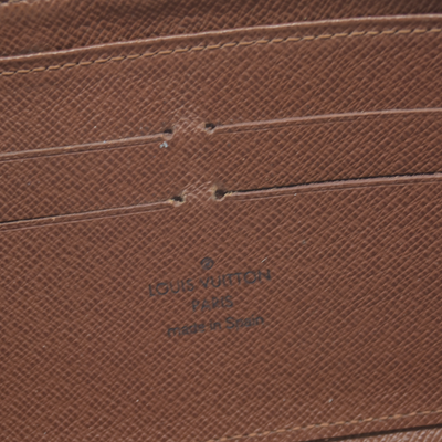 $915 2010 LOUIS VUITTON Monogram Zippy Wallet Brown CA2130