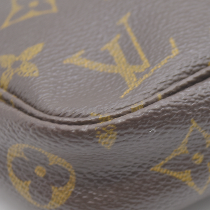 AUCTION $1290 Louis Vuitton Monogram Pochette Accessories AR1011