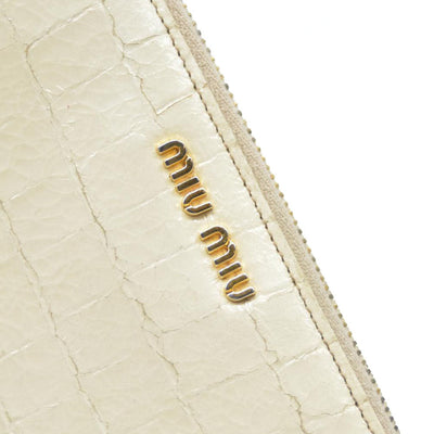 MIU MIU Logo Embossed Leather Zippy Long Wallet White