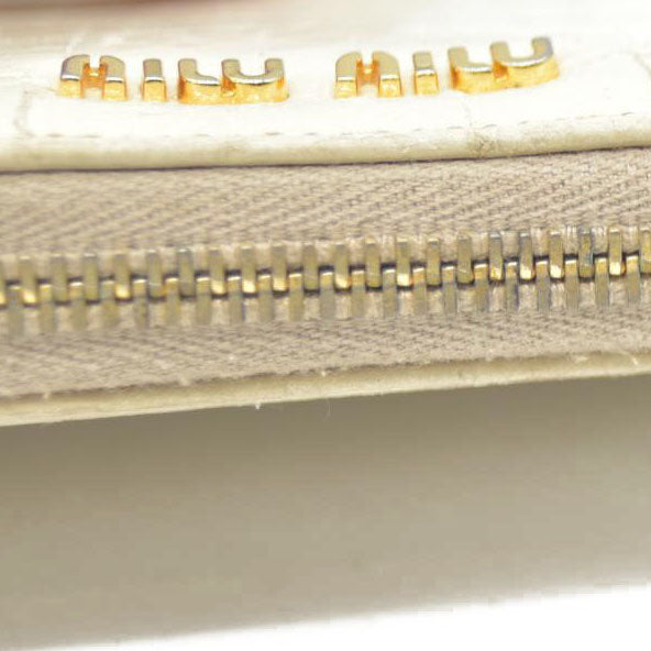 MIU MIU Logo Embossed Leather Zippy Long Wallet White
