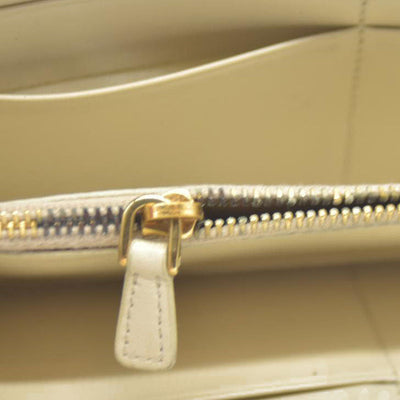 MIU MIU Logo Embossed Leather Zippy Long Wallet White