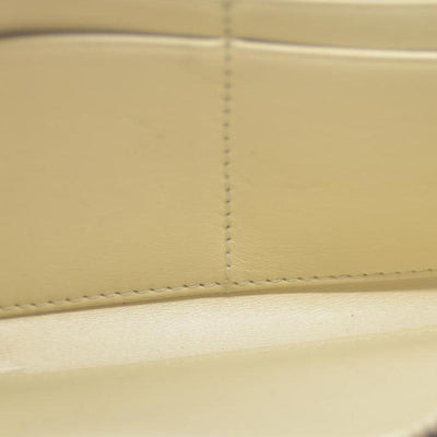 MIU MIU Logo Embossed Leather Zippy Long Wallet White